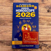 Blue annual horoscope book cover, 2026 edition with title text and zodiac icons