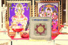 Durga yantra with stand: gold card with red circular mandala in clear acrylic stand