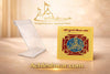 Gold and blue yantra card on clear acrylic stand, angled display