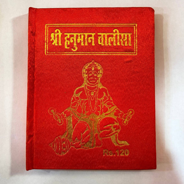 Red pocket Hanuman Chalisa book with gold Hanuman emblem and title