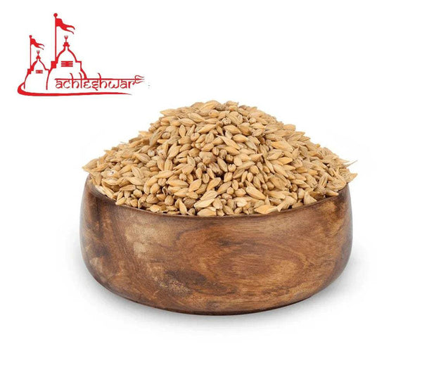 Jau grains in wooden bowl, tan kernels
