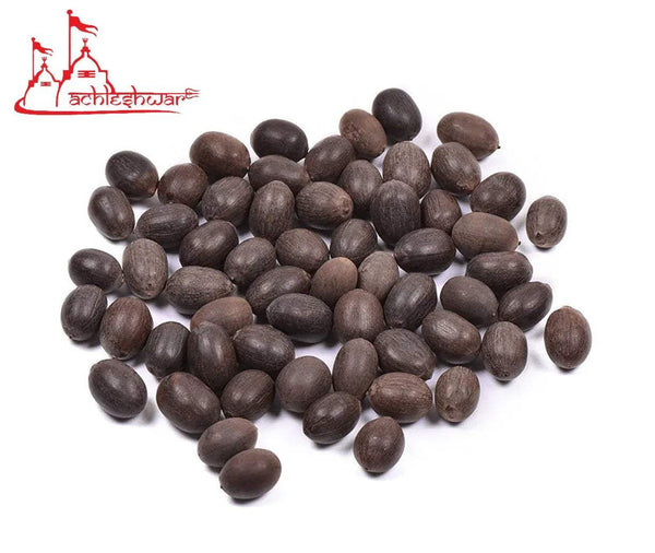 Kamal Gatta beads, dark brown rounded beads in a pile