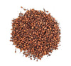Pile of dried brown spice buds with stems, whole and loose