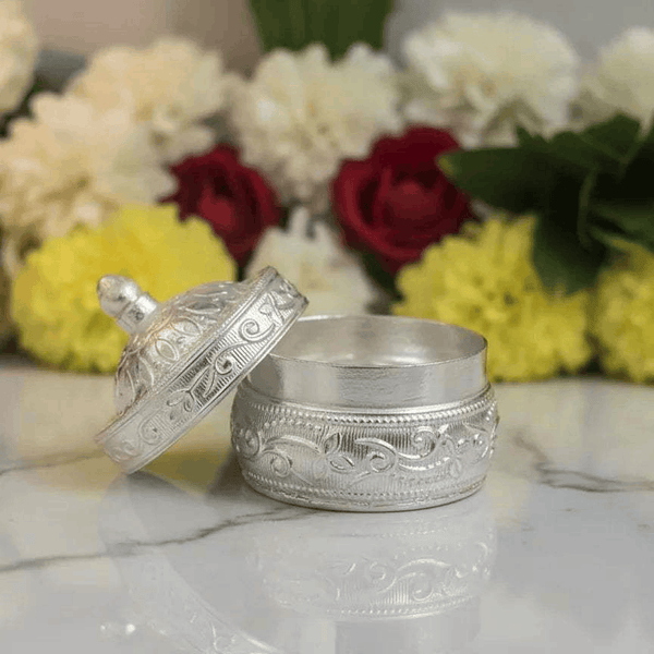 German silver lidded seva container with engraved lid top