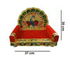 Wooden peacock throne seat with red cushion, carved gold arch and side posts; 37cm