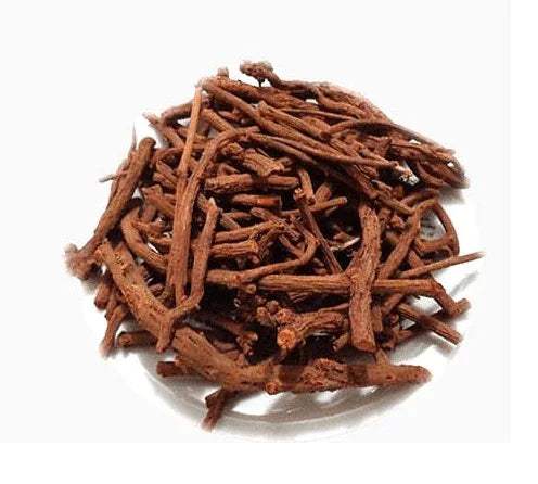 Majith Jadi Booti bark strips in spoon, dark brown, dried