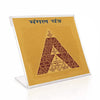 Gold and maroon triangular yantra card with clear plastic stand