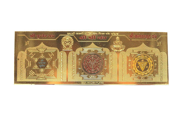 Golden yantra wall panel with three engraved mystical symbols and central chakra design