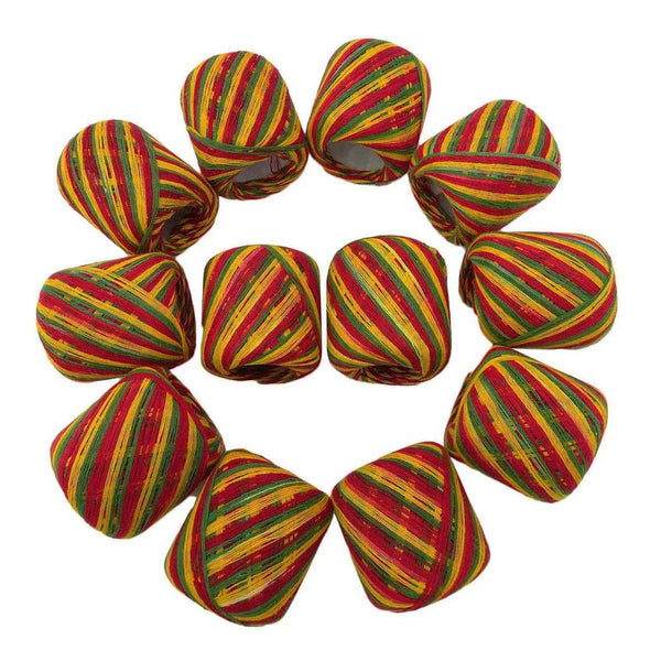 Set of multicolor striped yarn balls in circular loops, green red yellow stripes