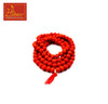 Orange bead mala necklace with tassel, looped into a circle