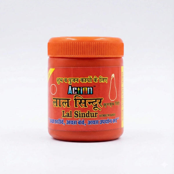 Red sindoor powder jar with orange cap and front label.