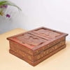 Wooden storage box with red-lined lid interior and gold star ornament pattern