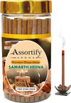 Heena dhoop sticks jar with gold lid, circular label, and incense sticks bundle