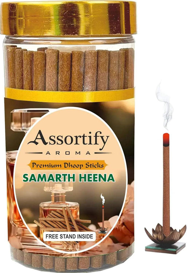 Heena dhoop sticks jar with gold lid, circular label, and incense sticks bundle