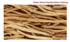 Satavari dried roots, long tan strips piled close-up