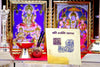 Shani yantra card in a decorative frame with dark numerals and deity emblem