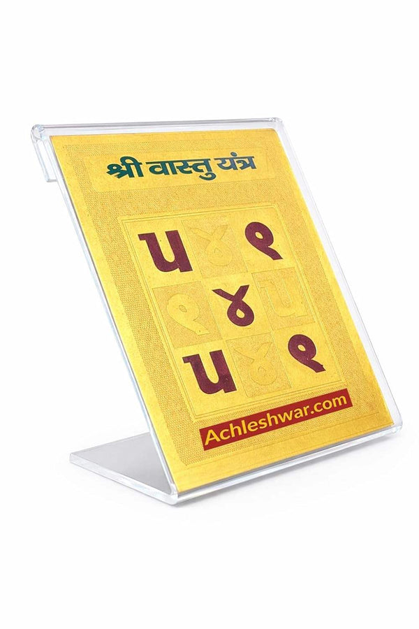 Gold-plated Vastu Yantra on clear stand, yellow-gold card with rune symbols