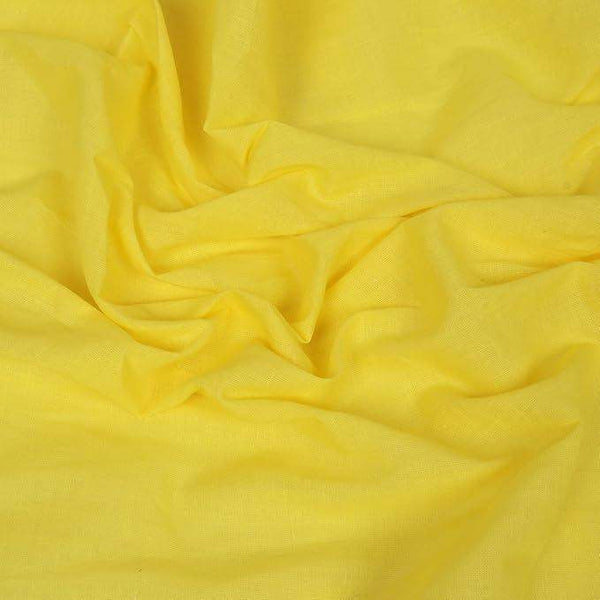 Yellow cotton gamcha fabric drape with soft woven texture, no stripes visible