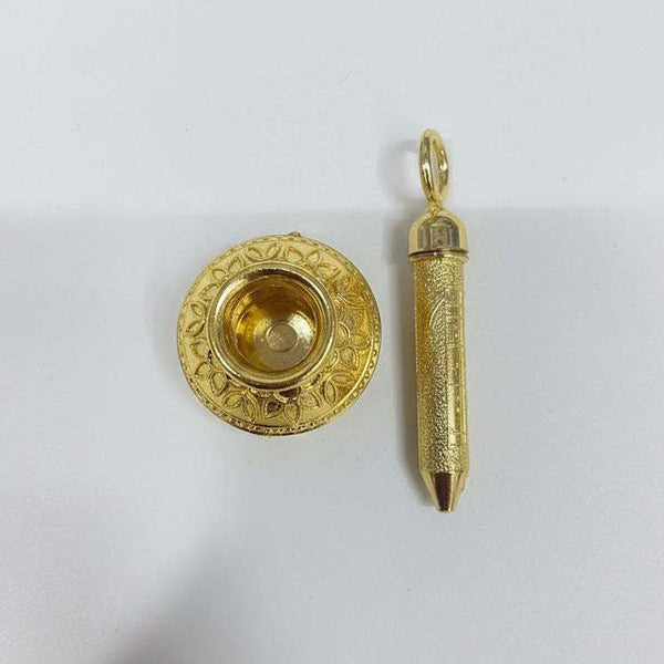 Golden pichkari and matki dish, separate pieces with ornate engraved patterns