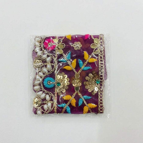 Decorative chunri cloth in purple with multicolor embroidered flowers, beads, and gold edging