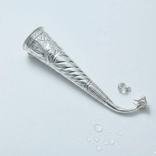 Silver-plated gaumukhi shringi with carved band and spiral ridged handle