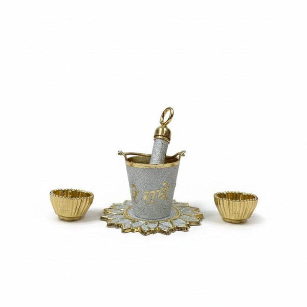 Holi festival plate set: gray pichkari bucket with gold base and two small bowls