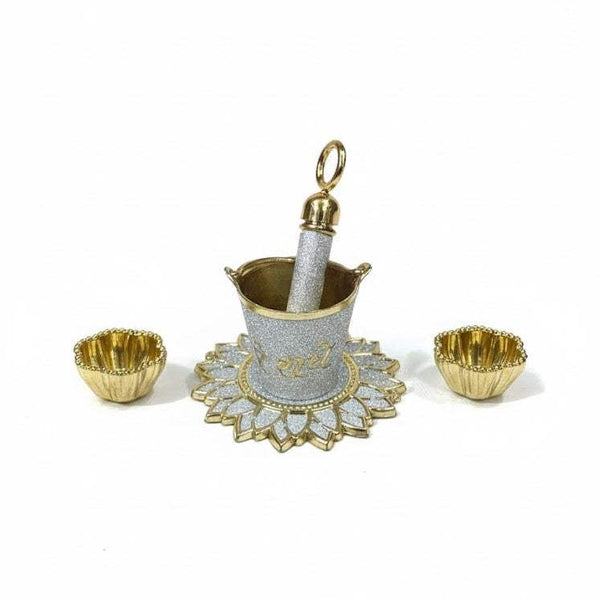 Holi plate set: gray pichkari bucket with gold ornate base and two small bowls