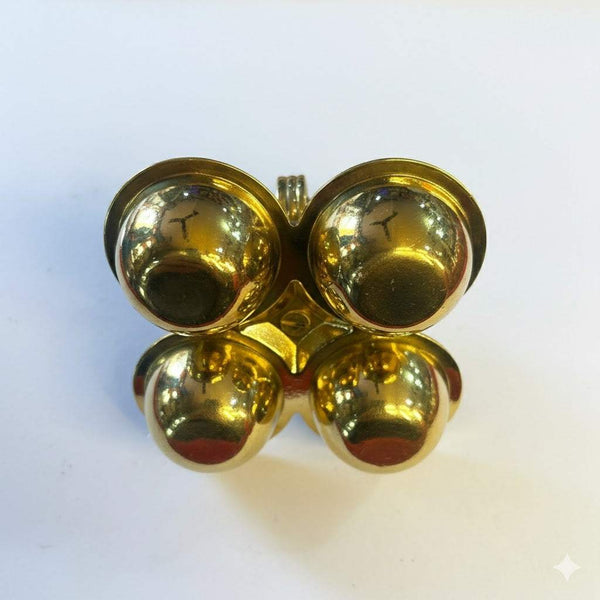 Gold four-cup puja bowl holder with mirrored finish and central knob