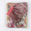 Pink and gold festival idol outfit with sheer fabric and ornate circular embroidery