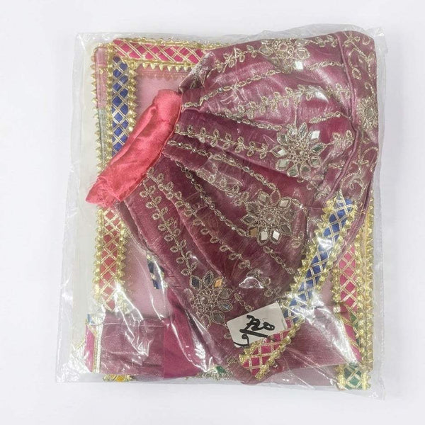 Pink and gold festival idol outfit with sheer fabric and ornate circular embroidery