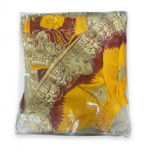 Yellow and gold idol outfit with maroon accents and ornate embroidered detailing