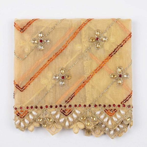 Cream chunri with gold thread floral pins, red stones, and pearl fringe border