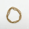Tulsi wooden mala with single loop of light-brown woven bead strand.