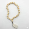 Tulsi mala rosary of light wooden beads with gold Ram script and white tassel
