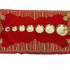 Set of small brass pooja plates shown in a row along a tray