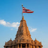 Temple dhwaj flag mounted on spire with red banner and gold border