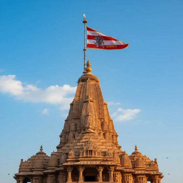Temple dhwaj flag mounted on spire with red banner and gold border