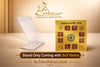 Ashta Laxmi yantra card displayed in a clear angled acrylic stand