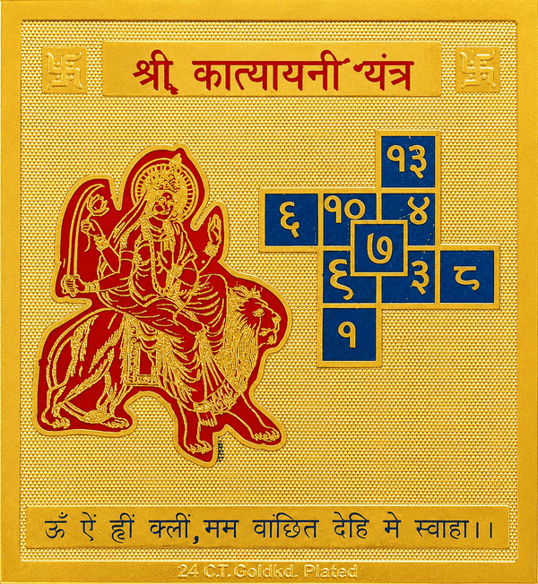 Gold-plated yantra tile with red deity figure and blue astrological grid