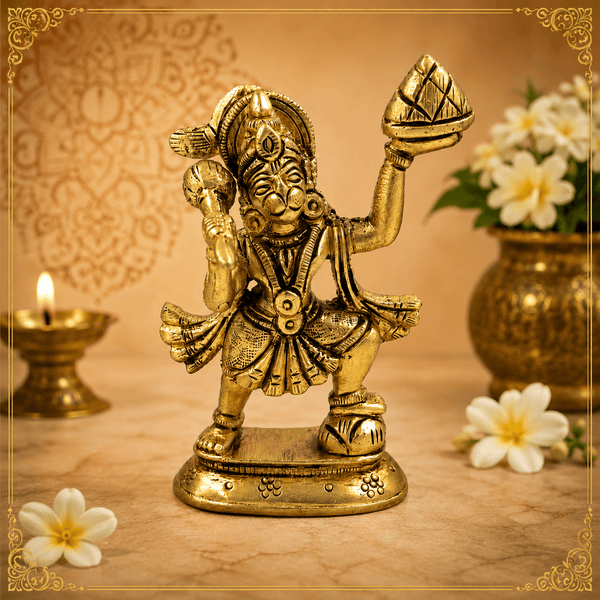 Golden Hanuman idol standing on round base, right hand raised with mace