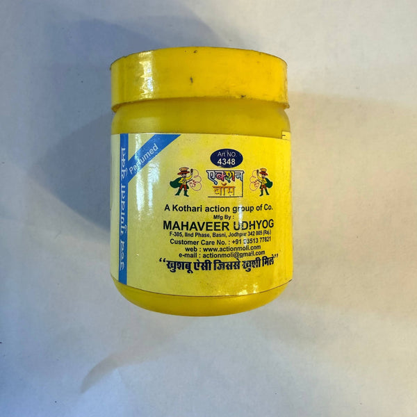 Action Abeer kumkum powder jar, yellow lid and back label, sealed container