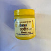 Action Abeer kumkum powder jar, yellow lid and light yellow front label