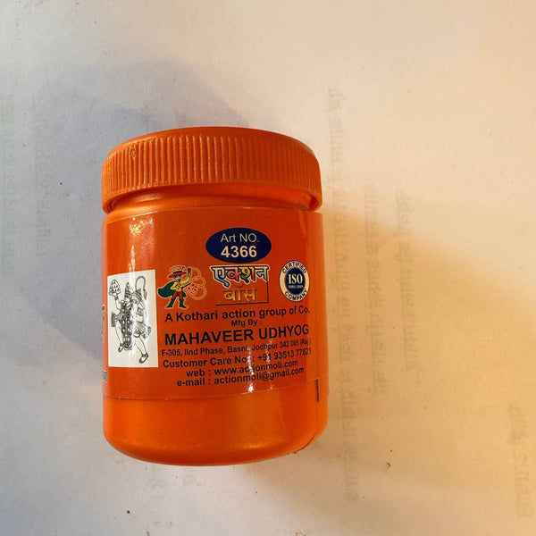 Orange sindoor powder container with back label and barcode