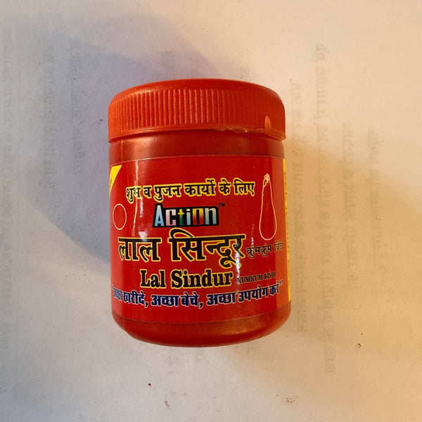 Action Lal Sindur powder jar with red lid and gold front label