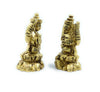 Gold-tone seated Laxmi and Ganesh figurines, front view, detailed ornamentation