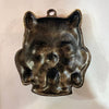 Bronze bhoot face mask wall hanging with catlike face and top hanging hole