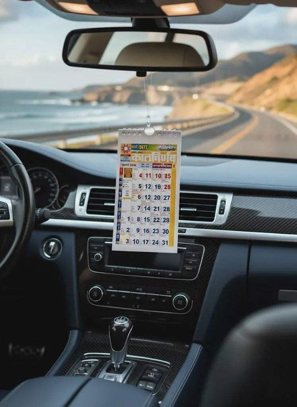 Kalnirnay 2026 Hindi car dashboard calendar with date blocks on display