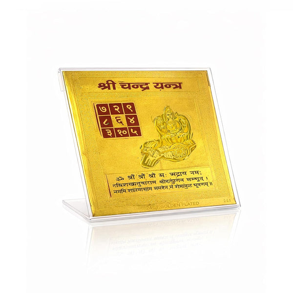 Gold plated yantra card on clear stand with lunar chakra grid and Hindi text