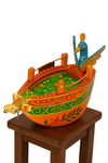 Colorful wooden boat figurine with peacock figure and decorative leaf patterns