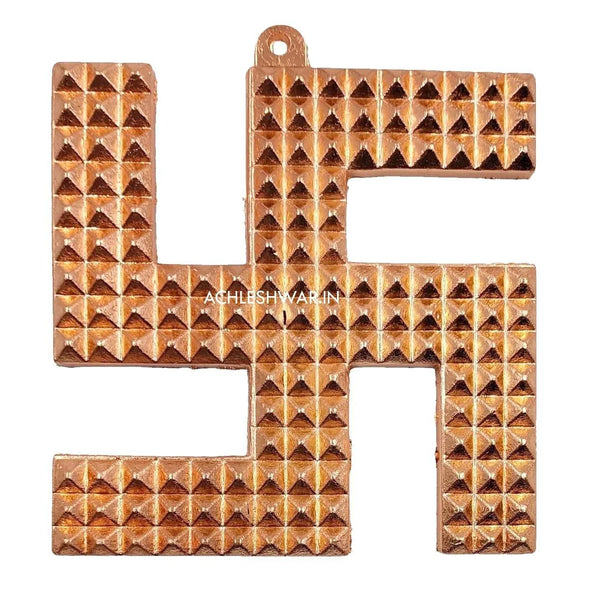 Copper swastik pyramid wall hanging with geometric cube pattern and top hanging hole
